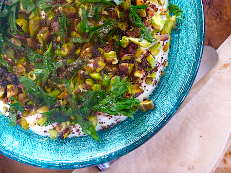 Labneh dip with pistachios, parsley, sumac and lemon