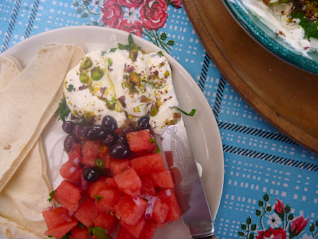 Labneh dip with watermelon salad, olives and flat bread