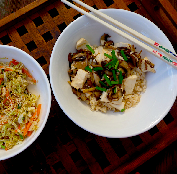 Brown rice bowl with mushrooms, tofu, ginger and wombok slaw