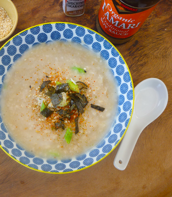 savoury porridge with soy sauce, green onions, sesame seeds and nori