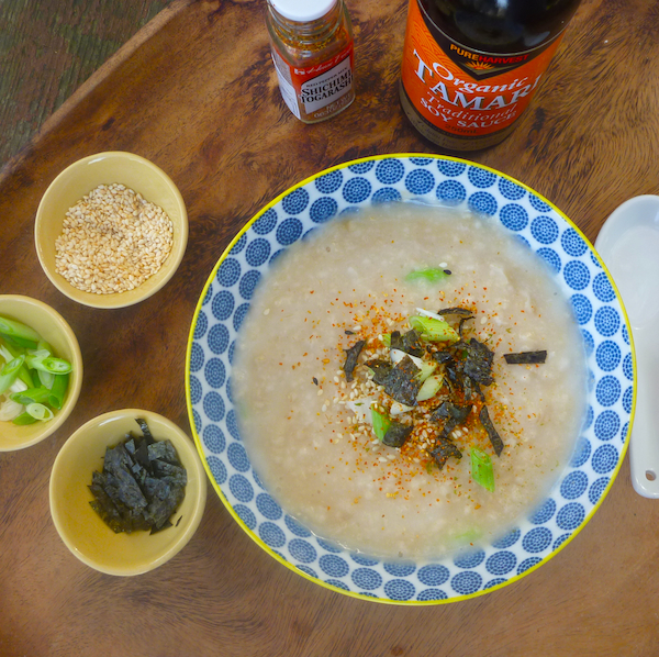 Savoury porridge with spring onions, soy sauce, sesame seeds and nori